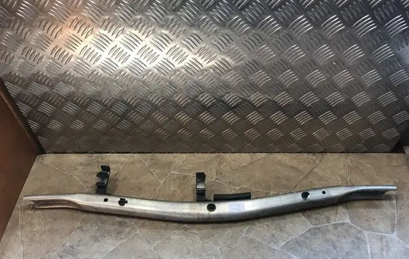 Top upper radiator support slam panel