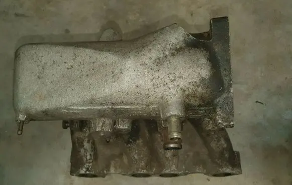 Volkswagen Golf II Intake manifold 037133223AD