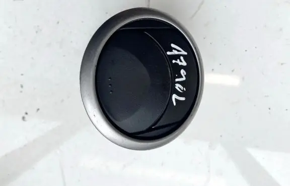 Dash center air vent grill