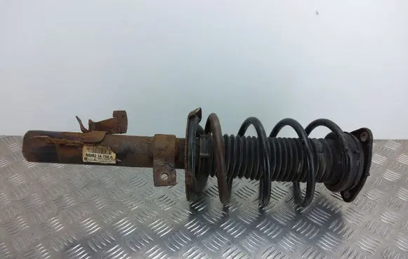 Mazda 3 II Front shock absorber with coil spring BBM234700A 8N6118045AD