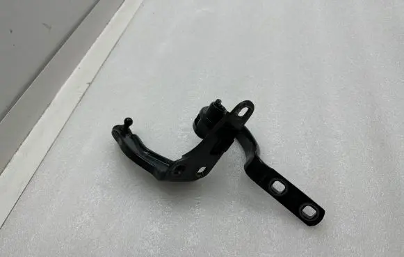 Rear door upper hinge