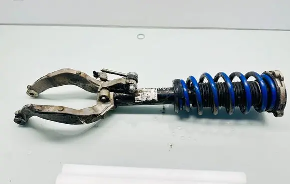 Front shock absorber with coil spring