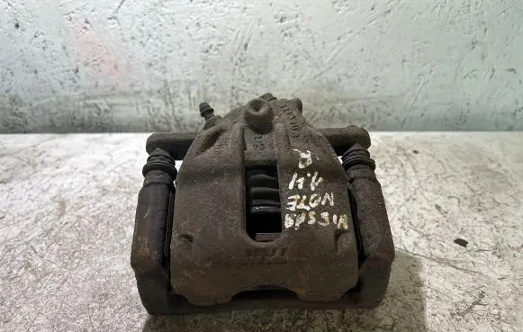 Nissan Note (E11) Front brake caliper