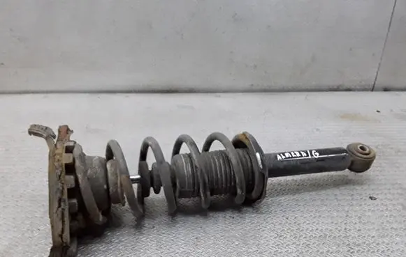 Nissan Almera N16 Rear shock absorber with coil spring 