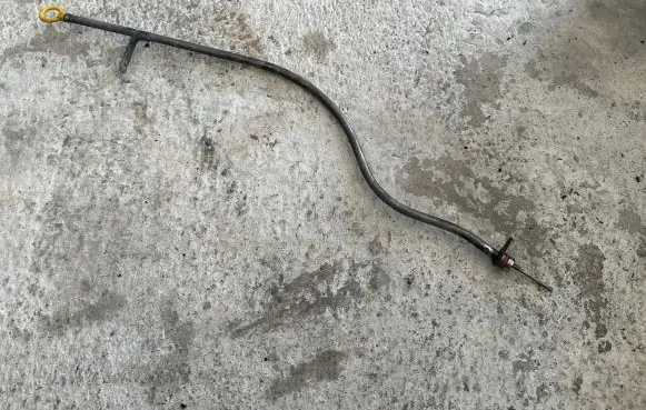 Oil level dip stick