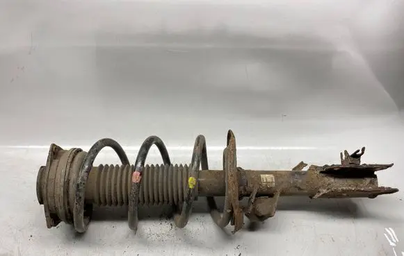 Front shock absorber with coil spring