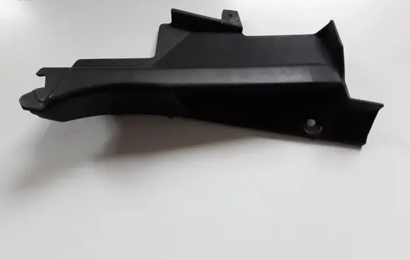Engine bonnet/hood lock trim molding