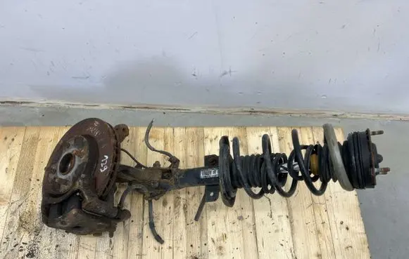 Mazda 2 Front shock absorber with coil spring