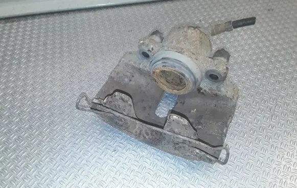 Volkswagen Golf VI Front brake caliper 