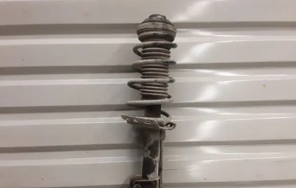 Opel Astra H Front shock absorber with coil spring 22214598