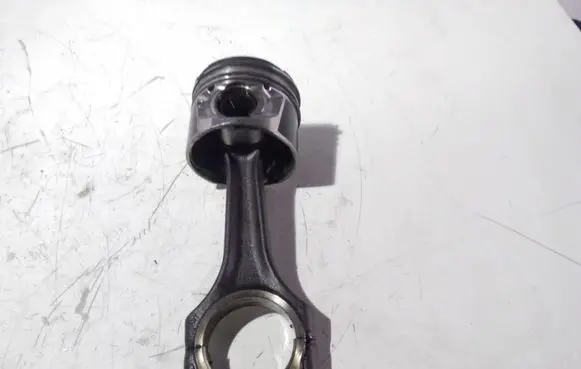Piston with connecting rod