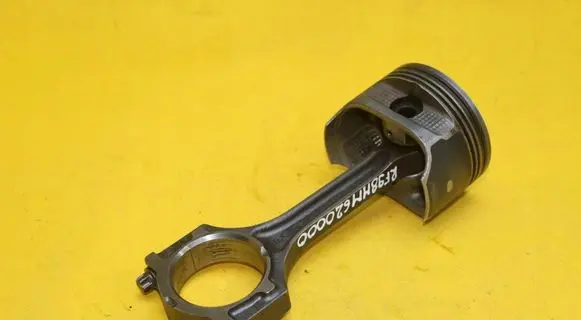 Piston with connecting rod