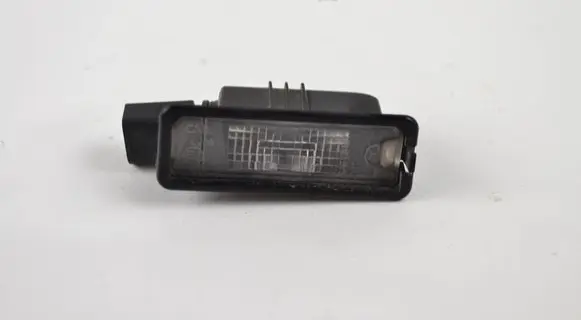 Volkswagen Golf VII Number plate light 1K8943021