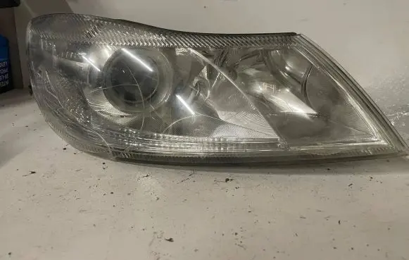 Skoda Octavia Mk2 (1Z) Headlight/headlamp 1EL24705226 24705226000093