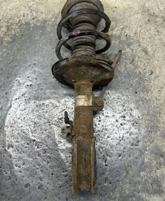Toyota Avensis T250 Front shock absorber with coil spring
