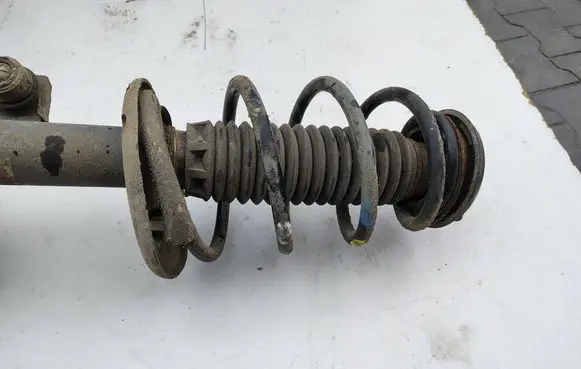 Peugeot Partner Front shock absorber with coil spring