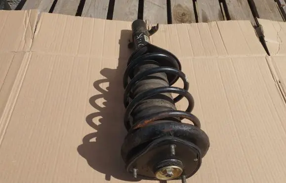 Honda Concerto Front shock absorber with coil spring 22080850