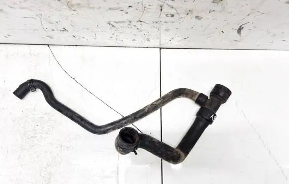 Volkswagen PASSAT B5 Engine coolant pipe/hose 8D0121055