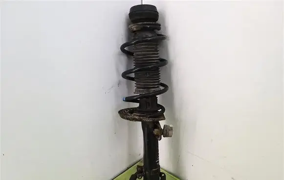 Front shock absorber with coil spring