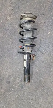 Volkswagen Caddy Front shock absorber/damper