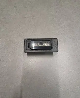 Volkswagen PASSAT B7 Number plate light 3AF943021A