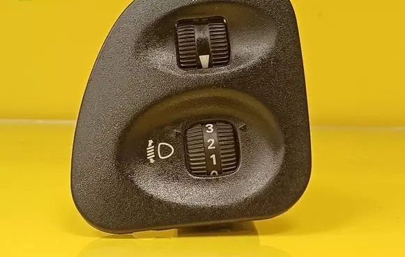 Headlight level height control switch