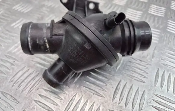 Thermostat/thermostat housing