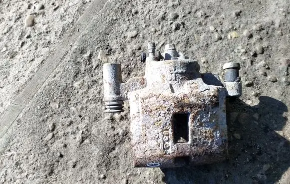 Mazda 323 Front brake caliper