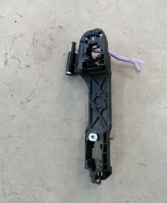 Rear door exterior handle/bracket