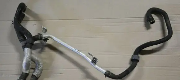 Volkswagen Polo V 6R Engine coolant pipe/hose 04E121070AB