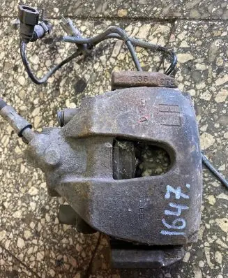 Volkswagen Touareg I Front brake caliper 1181710022