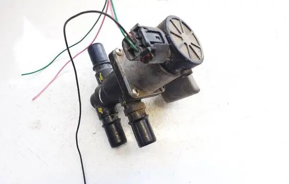 Coolant heater control valve