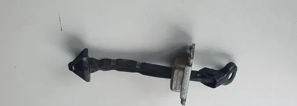 Mazda 3 II Rear door check strap stopper