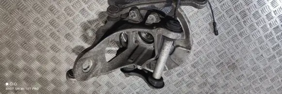 Rear wheel hub spindle/knuckle