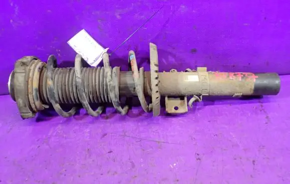 Volkswagen Polo Front shock absorber with coil spring 6Q0413031BM