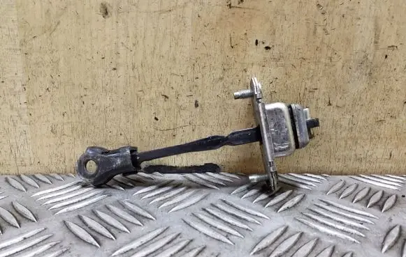 Subaru Outback Rear door check strap stopper