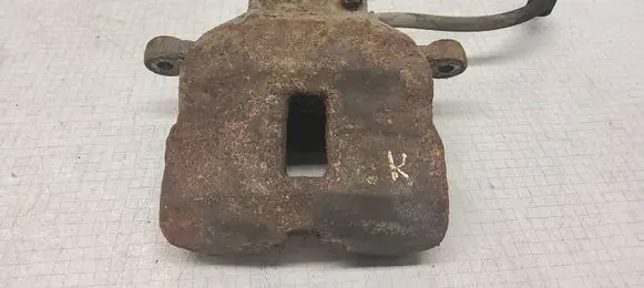 Nissan Almera N16 Front brake caliper