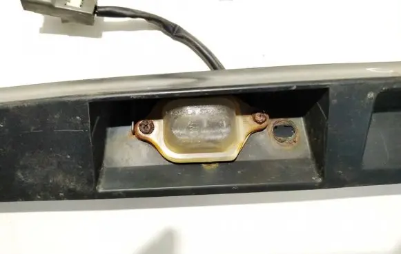 KIA Carens I Number plate light 005007