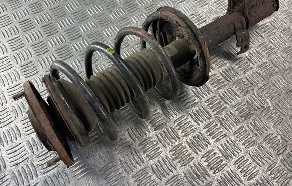 Toyota Corolla E120 E130 Front shock absorber with coil spring