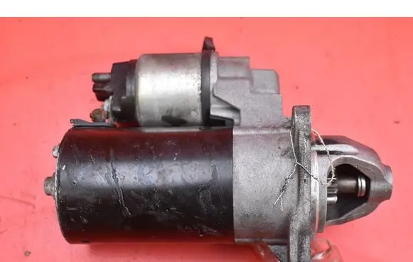 Opel Astra J Starter motor 55572440