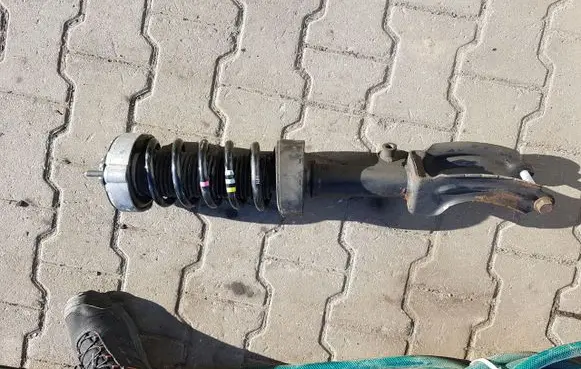 Volkswagen Touareg II Front shock absorber with coil spring