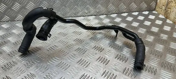 Skoda Octavia Mk3 (5E) Engine coolant pipe/hose 04L121064AQ