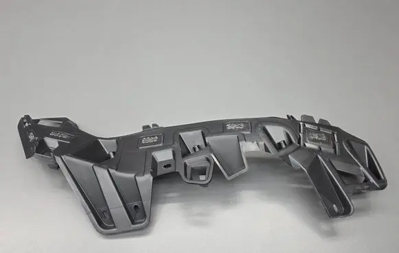 Peugeot 208 II Front bumper mounting bracket 9824999580 P210
