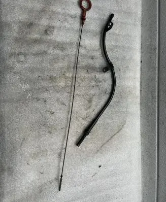 Oil level dip stick