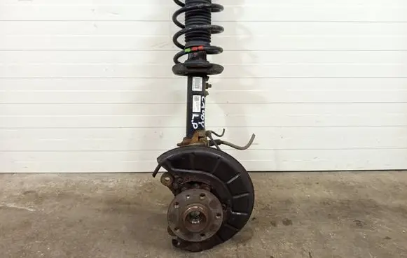 Volkswagen Caddy Front shock absorber with coil spring 2K5412021AG 2K5413031