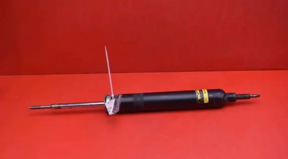 Rear shock absorber/damper