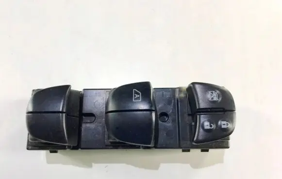 Nissan Juke I F15 Electric window control switch