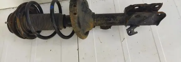 Front shock absorber with coil spring