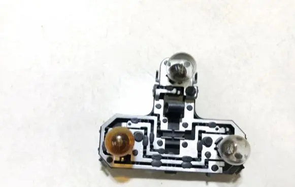 Volvo S80 Tail light bulb cover holder