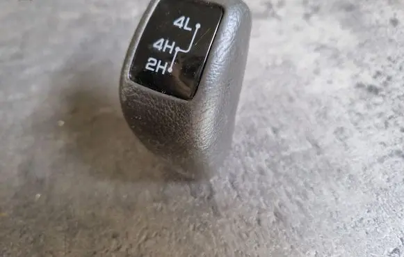 Mitsubishi Pajero Sport I Gear lever shifter trim leather/knob 